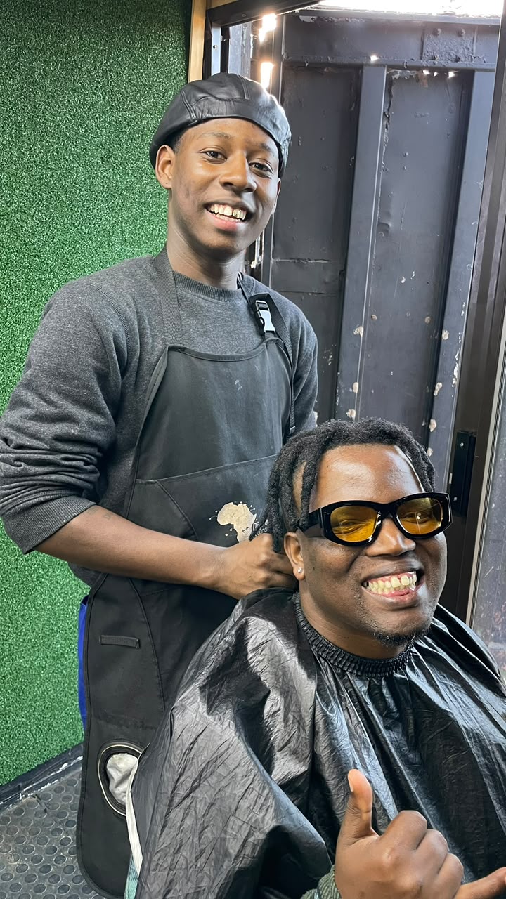 Happy client after a cut at S.K Alpha